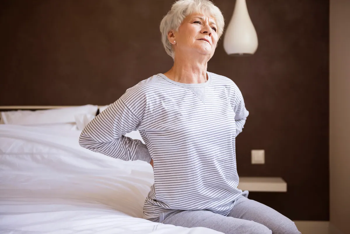 old woman suffer herniated disc