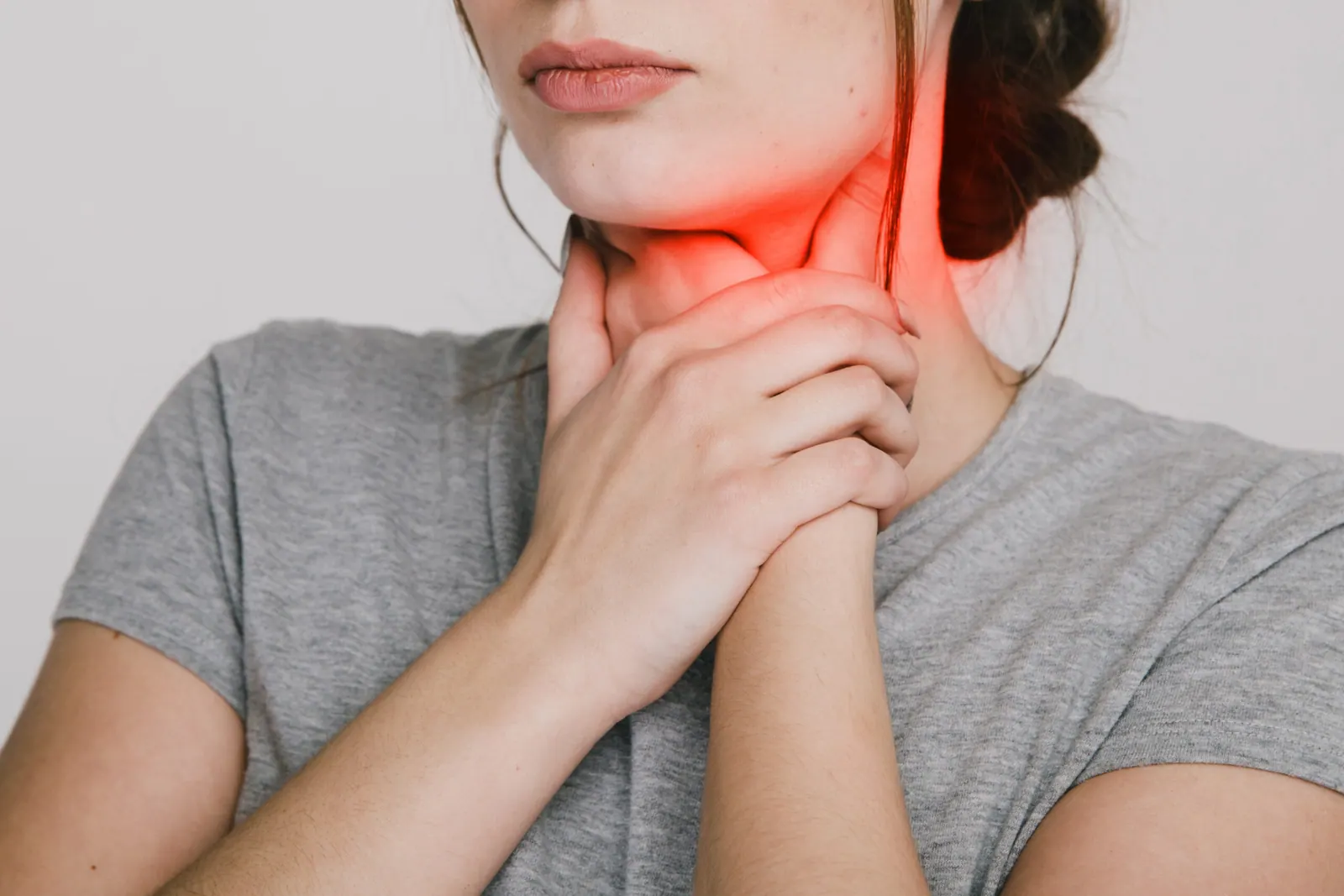 woman suffer from cellular detoxification in throat