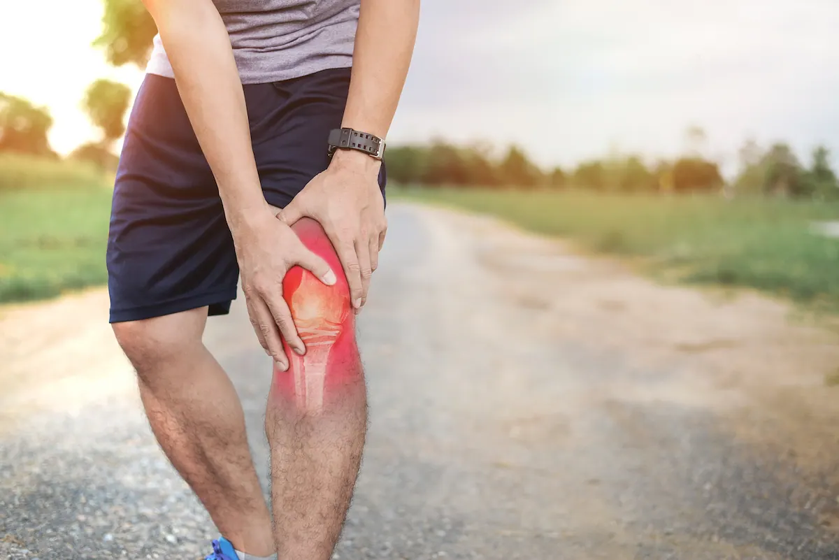 athlete man in knee sprain