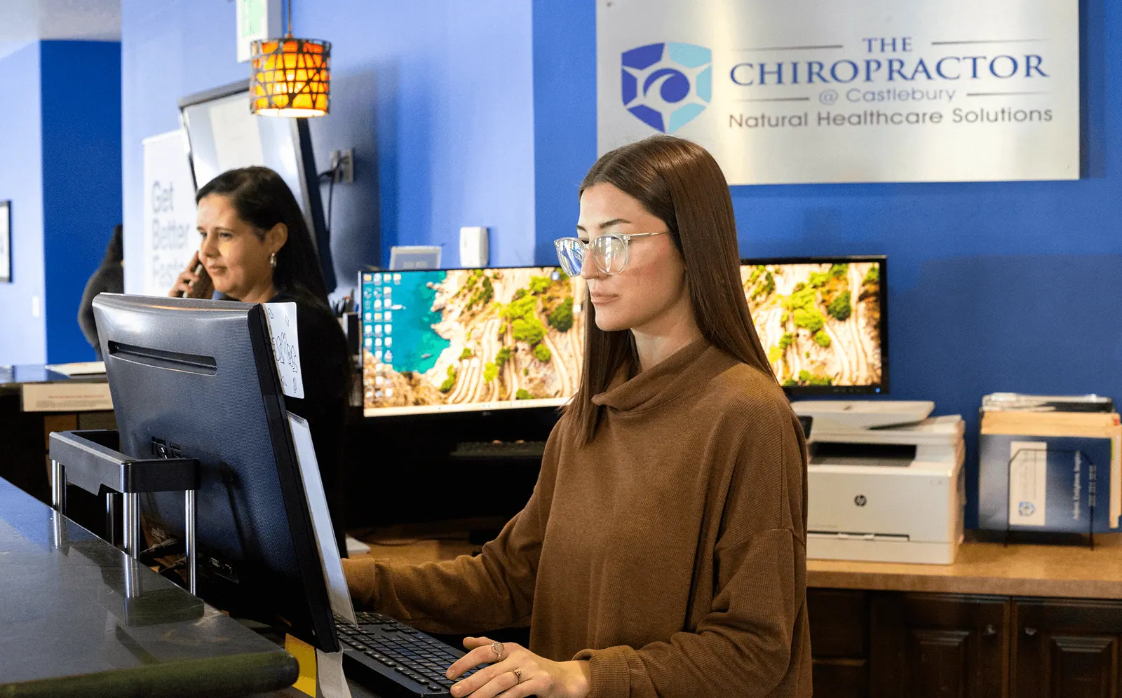 Front desk team at The Chiropractor at Castlebury in Eagle, ID